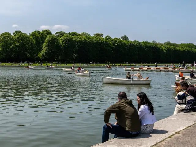 rowboats on grand canal in versailles